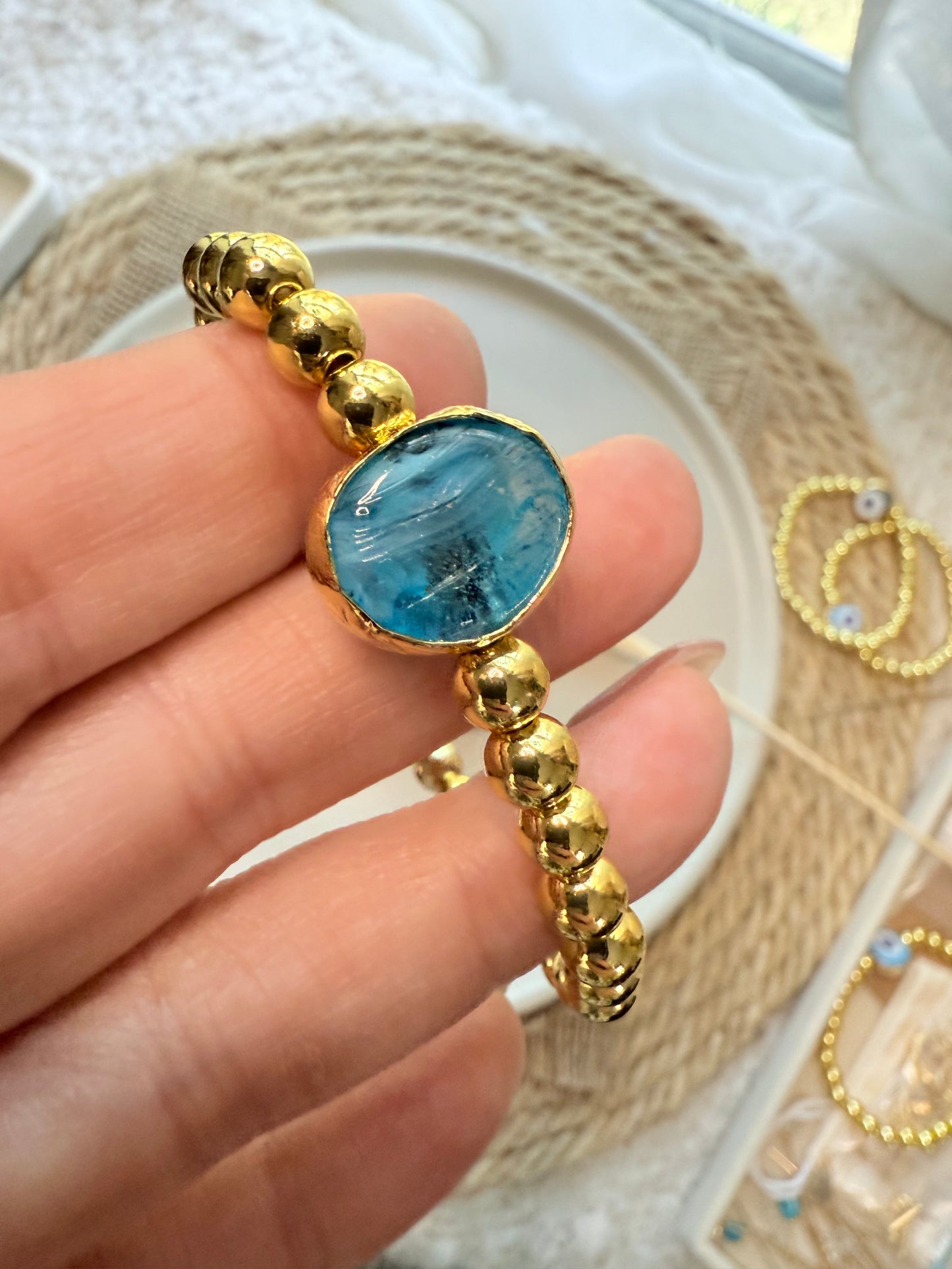 Translucent Blue Artsy Evil Eye + Gold Beaded Bracelet