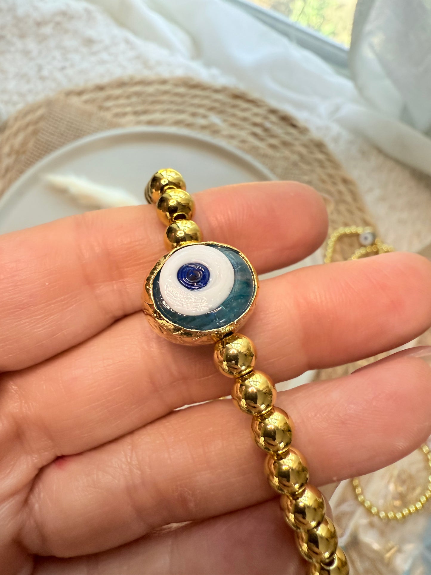 Translucent Blue Artsy Evil Eye + Gold Beaded Bracelet