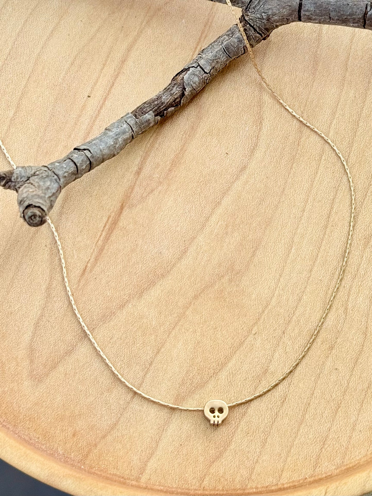 Itty Bitty Matte Gold Skull Necklace