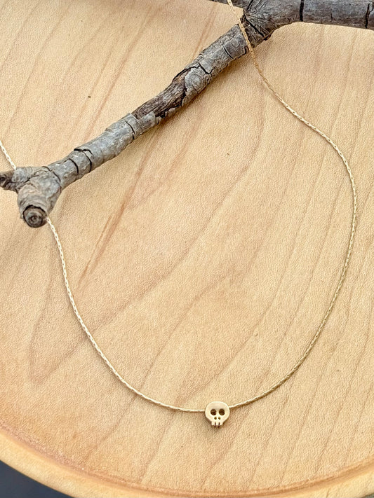 Itty Bitty Matte Gold Skull Necklace