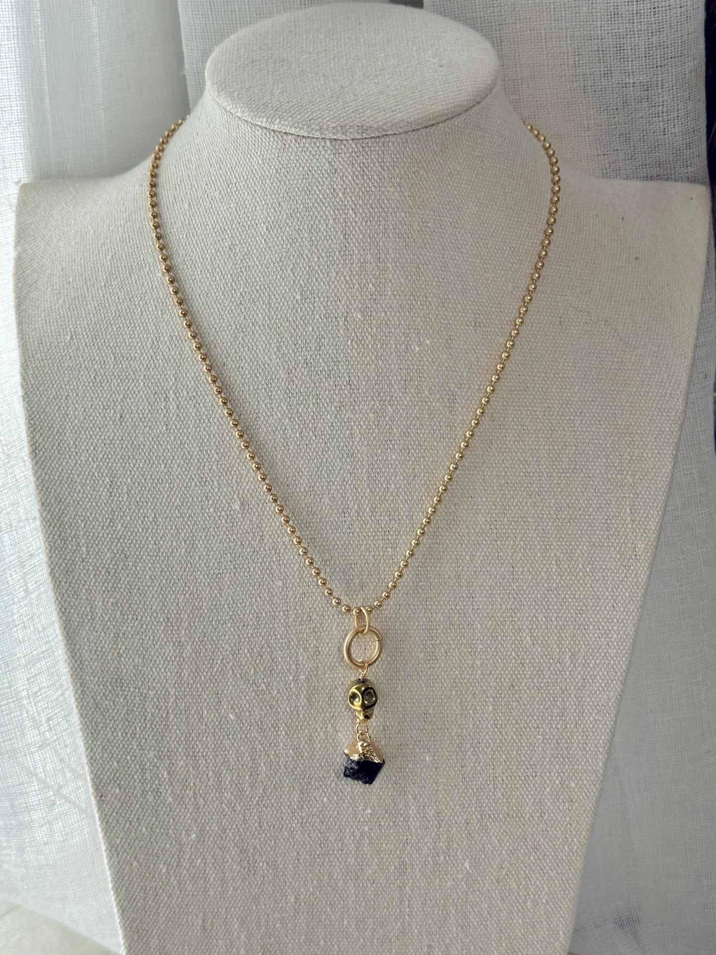 Garnet + Matte Gold Hematite Skull Necklace