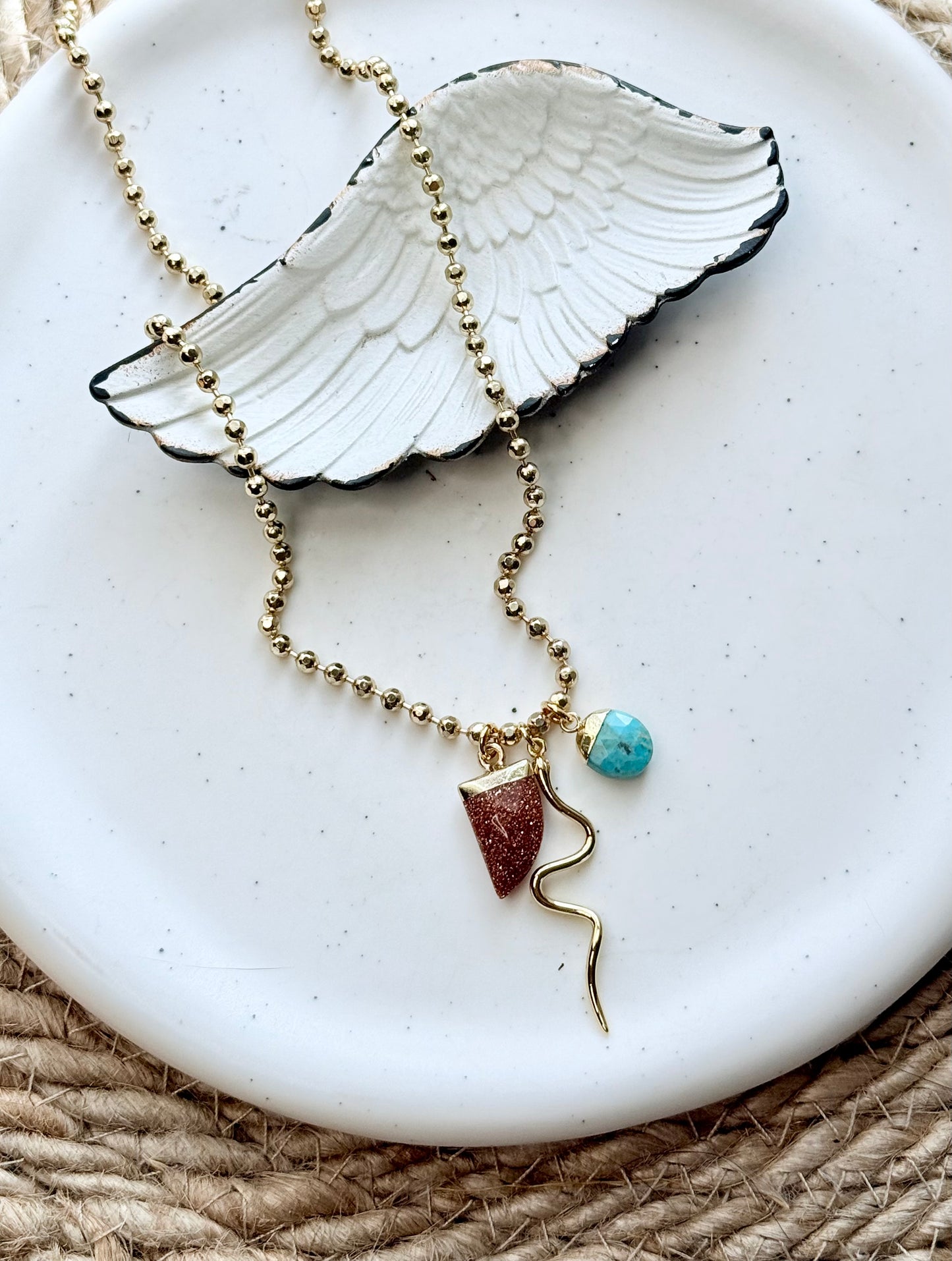 Turquoise + Goldstone Gold Snake Necklace