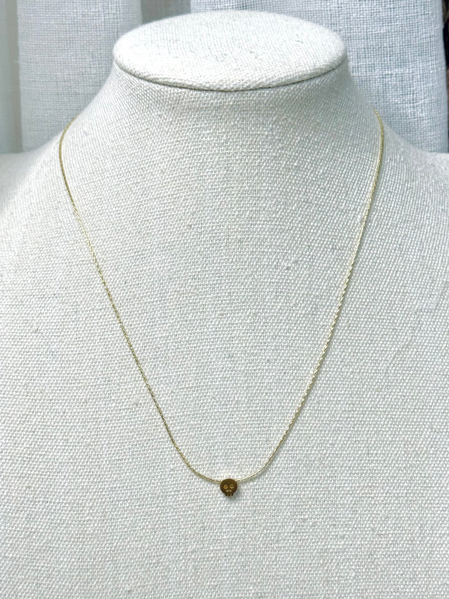 Tiny Matte Gold Skull Necklace