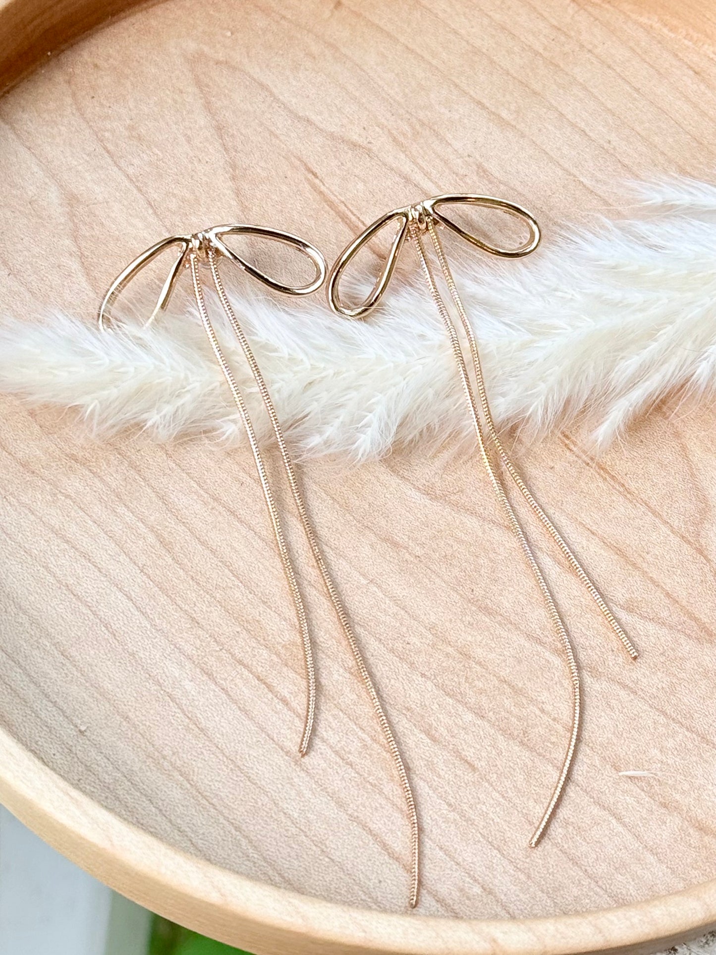 Gold Long Bow Earrings