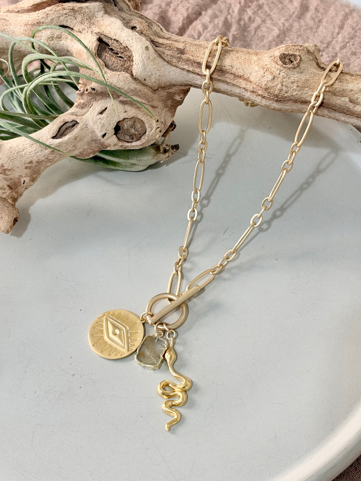 Rutile Quartz + Matte Gold Evil Eye Toggle Necklace