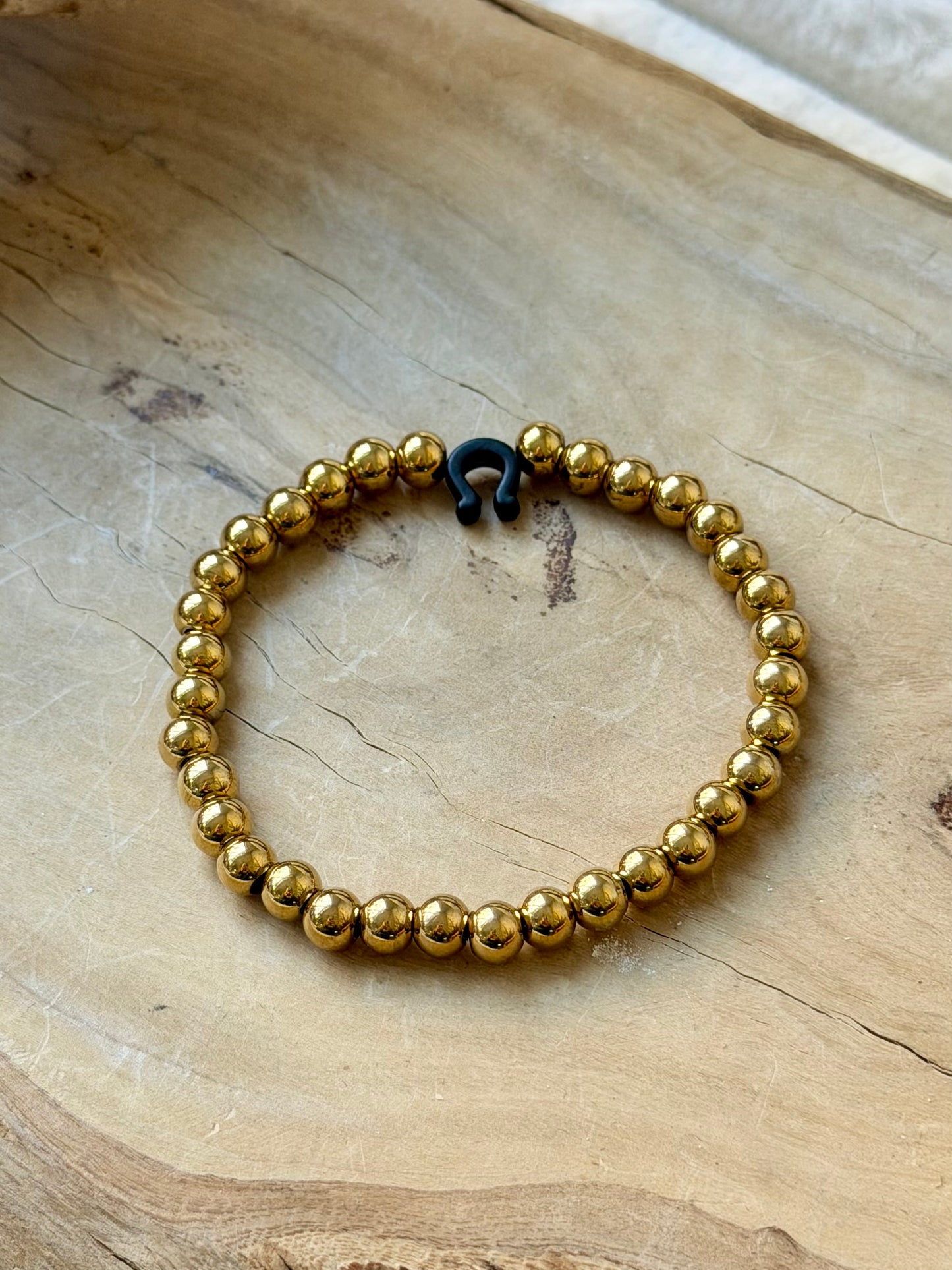 Matte Black Horseshoe + Gold Stainless Steel Bracelet